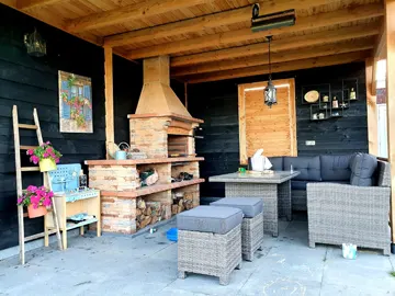 Tuinhaard bbq Sevilla onder overkapping 